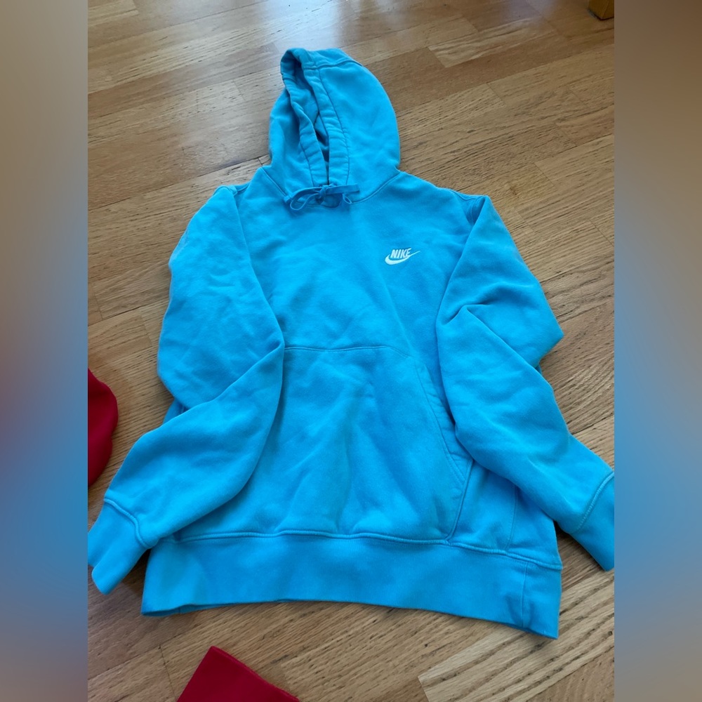 Blue small men’s NIKE hoodie, worn lightly